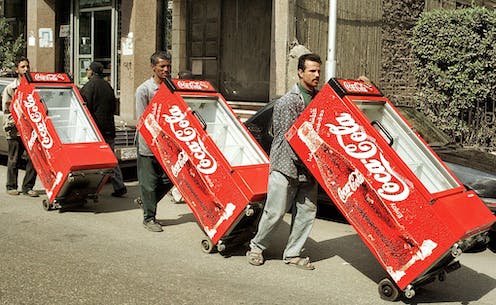 Coca-Cola's biggest challenge in greening its operations is its own global marketing strategy