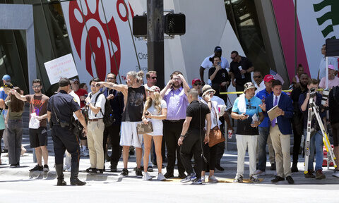 Trump supporters cheer wildly as he arrives at Miami courthouse, while others protest