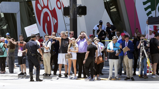 Trump supporters cheer wildly as he arrives at Miami courthouse, while others protest