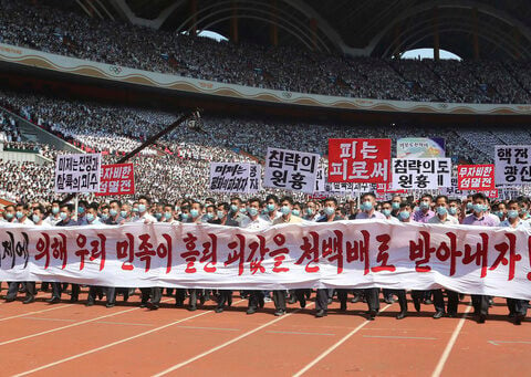 Thousands of North Koreans march in anti-US rallies as country marks Korean War anniversary