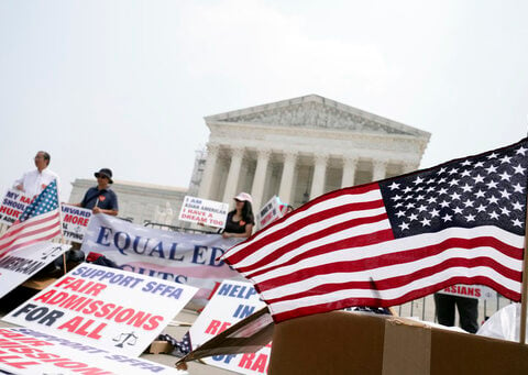 In the Supreme Court chamber, the subject was race, the mood was somber, the criticism harsh