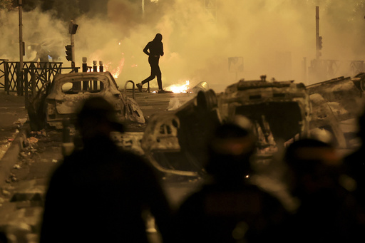 600 arrested and 200 police officers hurt on France's 3rd night of protests over teen's killing