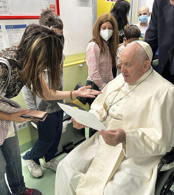 Pope visits children's cancer ward in sign he may soon be discharged from hospital