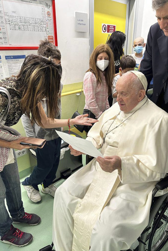 Pope visits children's cancer ward in sign he may soon be discharged from hospital