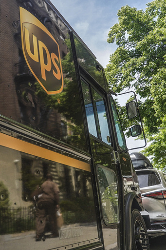 Unionized UPS workers vote to authorize a strike in high-stakes negotiations for a new contract