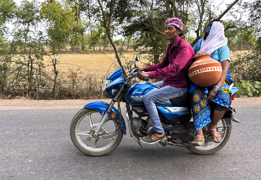 Nearly 100 die as India struggles with a sweltering heatwave in 2 most populous states