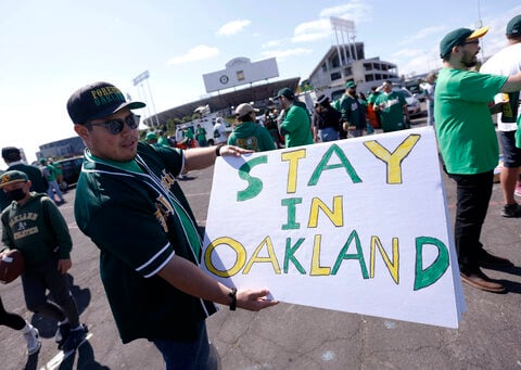 A's fans come out en masse for reverse boycott and tell owner John Fisher to sell