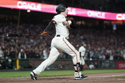 Yastrzemski splashes 3-run HR into McCovey Cove in the 10th as the Giants rally past the Padres 7-4