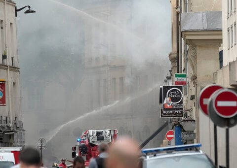 Explosion hits a building in Paris, injuring four people. Police are trying to determine the cause