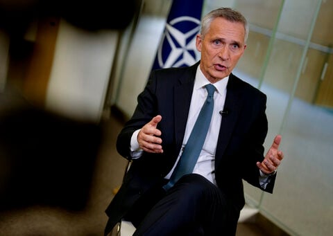 NATO wants to fight climate change. Its chief tells AP the trick is to make armies green but strong