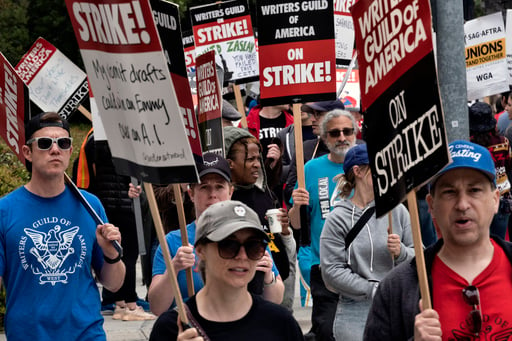 Hollywood writers at rally say they'll win as strike reaches 50 days