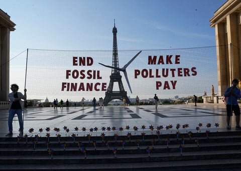 World leaders, activists in Paris seek financial response to climate emergency, poverty