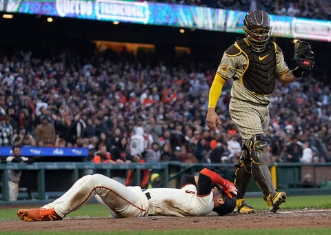 Overturned calls at home plate proving costly to the Padres and Rangers