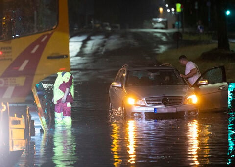 Storms and heavy rain flood roads, block railway lines in Germany