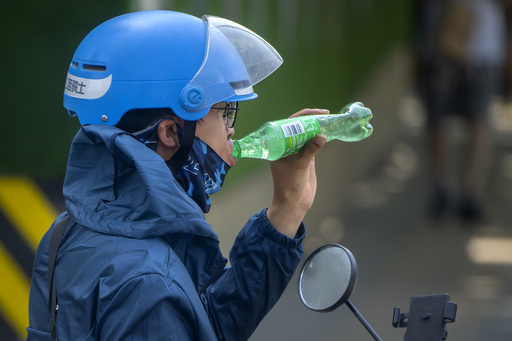 Beijing sizzles under worst heat wave and authorities ask people to stay indoors