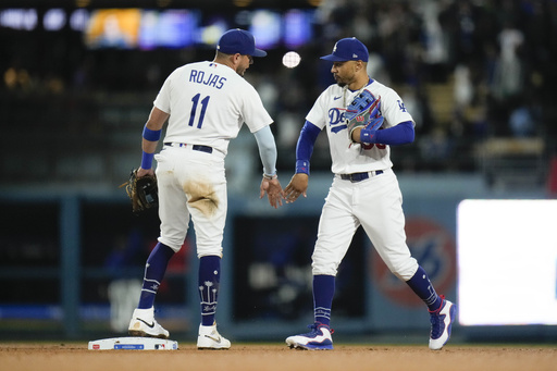 Dodgers edge defending champion Astros 3-2 as LA fans rain down boos on Altuve and Bregman