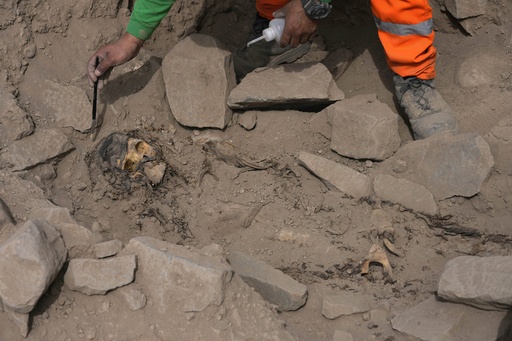 Archeologists find mummy surrounded by coca leaves on hilltop in Peru's capital