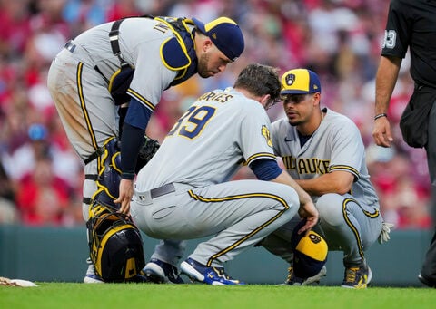 Corbin Burnes overcomes heat scare to fan 13 in the Brewers' 1-0 victory over the Reds