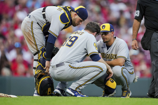 Corbin Burnes overcomes heat scare to fan 13 in the Brewers' 1-0 victory over the Reds