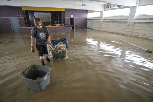 Vermont starts long road to recovery from historic floods, helped by army of volunteers