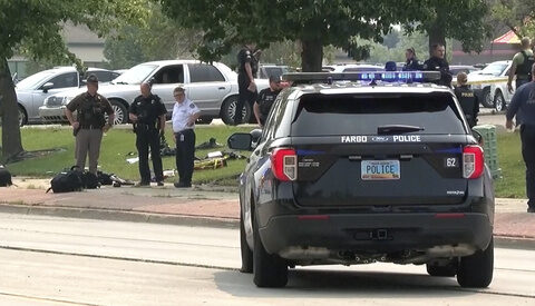 Officer killed and 2 police injured in shooting that also left suspect dead on a North Dakota street