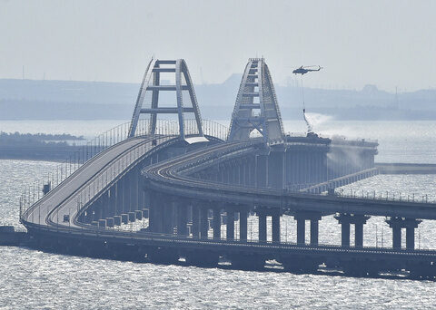 Traffic on key bridge connecting Crimea to Russia's mainland halted amid reports of explosions