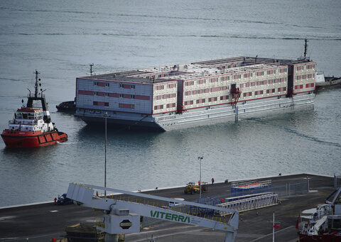 Barge to house asylum-seekers arrives in UK as Parliament passes controversial migration bill