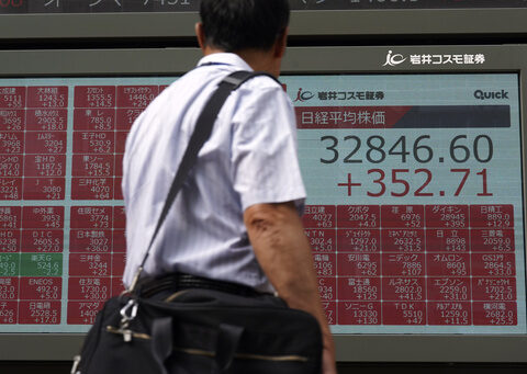 Stock market today: Asian shares track Wall Street rally despite mixed signals on regional economies