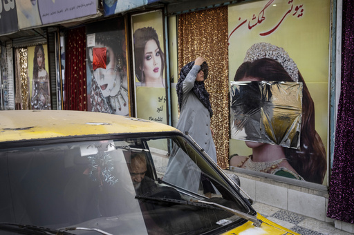 The Taliban use tasers, fire hoses and gunfire to break up Afghan women protesting beauty salon ban