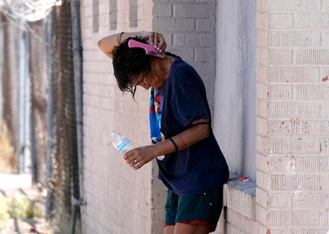 Little relief in sight from onslaught of searing heat and rising floodwaters in parts of US, 2 dead