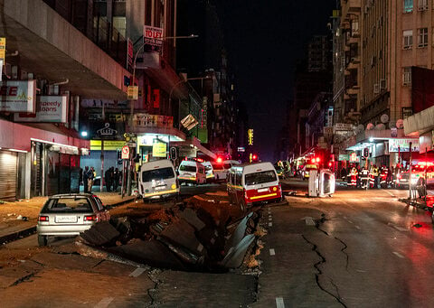 Suspected gas explosion in Johannesburg rips open roads and flips cars during rush hour, injuring 9