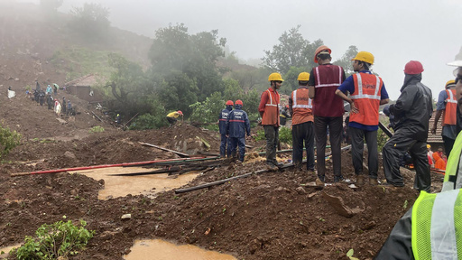 Landslide triggered by heavy rains kills 10 and traps many others in western India