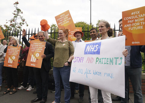 Thousands of UK hospital doctors walk out in latest pay dispute, crippling health services