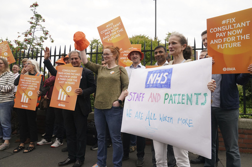 Thousands of UK hospital doctors walk out in latest pay dispute, crippling health services