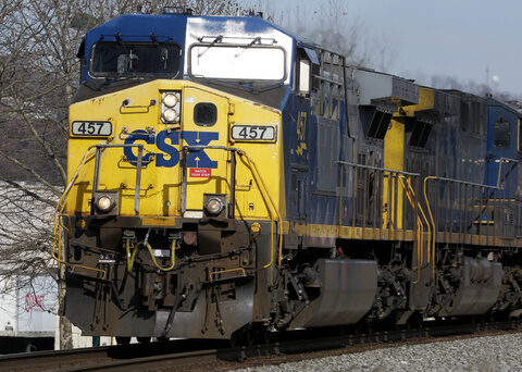 CSX's second-quarter profit declined as the railroad delivered fewer imported goods