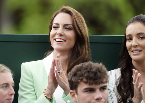 Princess Kate visits Wimbledon. Rain interrupts play for the 2nd straight day