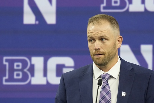 Northwestern interim coach fends for himself as Wildcats players skip annual Big Ten kickoff