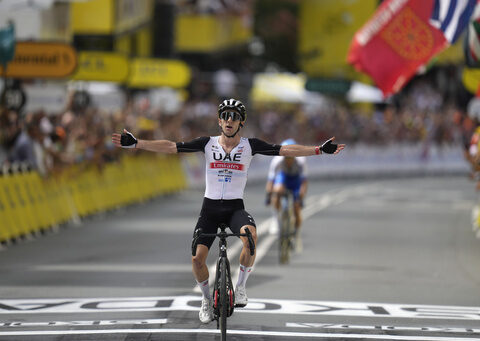 Adam Yates beats twin brother Simon Yates to win first stage of Tour de France