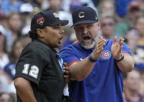 Cubs manager David Ross rips umpire and criticizes decision to close roof in Milwaukee