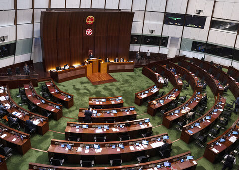 Hong Kong changes law to slash directly elected council seats, undermining democratic challenges