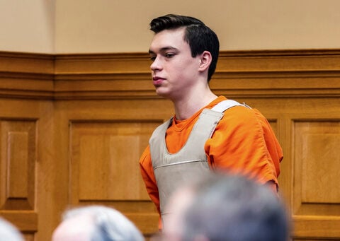 Hearing underway for first of 2 Iowa teens who pleaded guilty in 2021 beating death of teacher