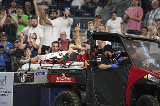 Cameraman injured at Yankee Stadium by wild throw has broken eye socket