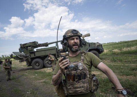 Ukraine's president hails the country's soldiers from a Black Sea island to mark 500 days of war