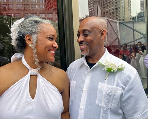 At New York's Lincoln Center, love is definitely in the air with a post-pandemic mass wedding