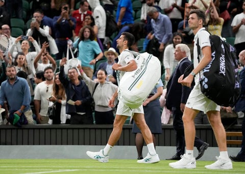 Novak Djokovic's Wimbledon match against Hubert Hurkacz was suspended and will continue Monday