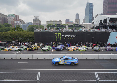 Heavy rains flood Chicago roads, NASCAR ends downtown street race and names winner