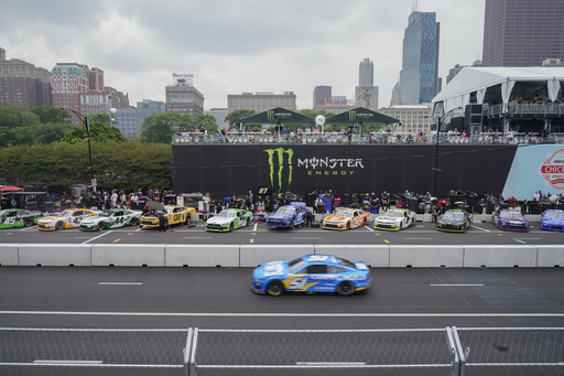 Heavy rains flood Chicago roads, NASCAR ends downtown street race and names winner