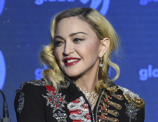 Madonna says she's 'on the road to recovery' following ICU stay, postpones North American tour dates