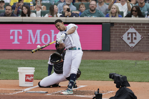 Julio Rodríguez hit a record 41 homers in the Home Run Derby's first round to beat Pete Alonso