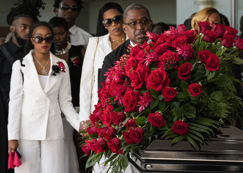 Friends and family gather for the funeral of Houston rapper Big Pokey